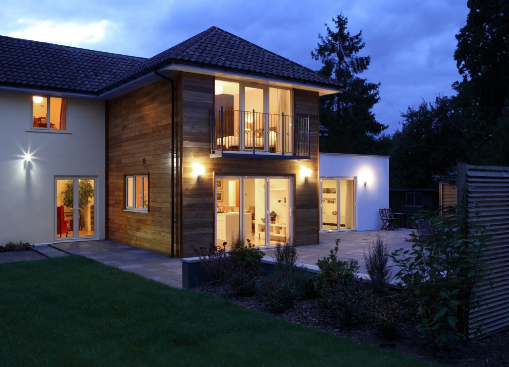 large house illuminated in the evening 2023 11 27 05 01 32 utc
