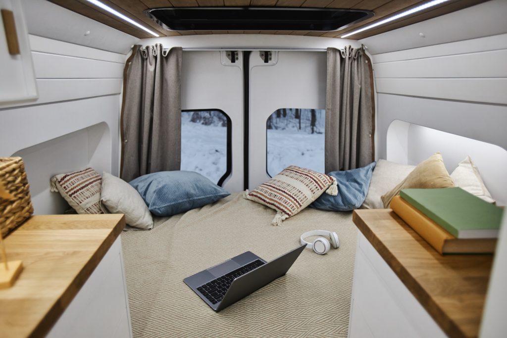 minimal trailer van interior with laptop on bed 2023 11 27 05 21 54 utc