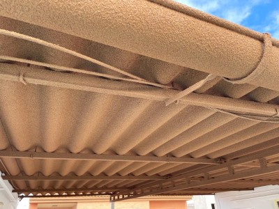 Asbestos roof encapsulation