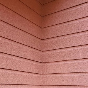 close up cladding corner redish